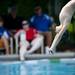 Racquet Club member Alec Simon does a backward dive during the final round of the Alec Simon on Monday, July 22. Alec broke the record and scored 110 points. Daniel Brenner I AnnArbor.com